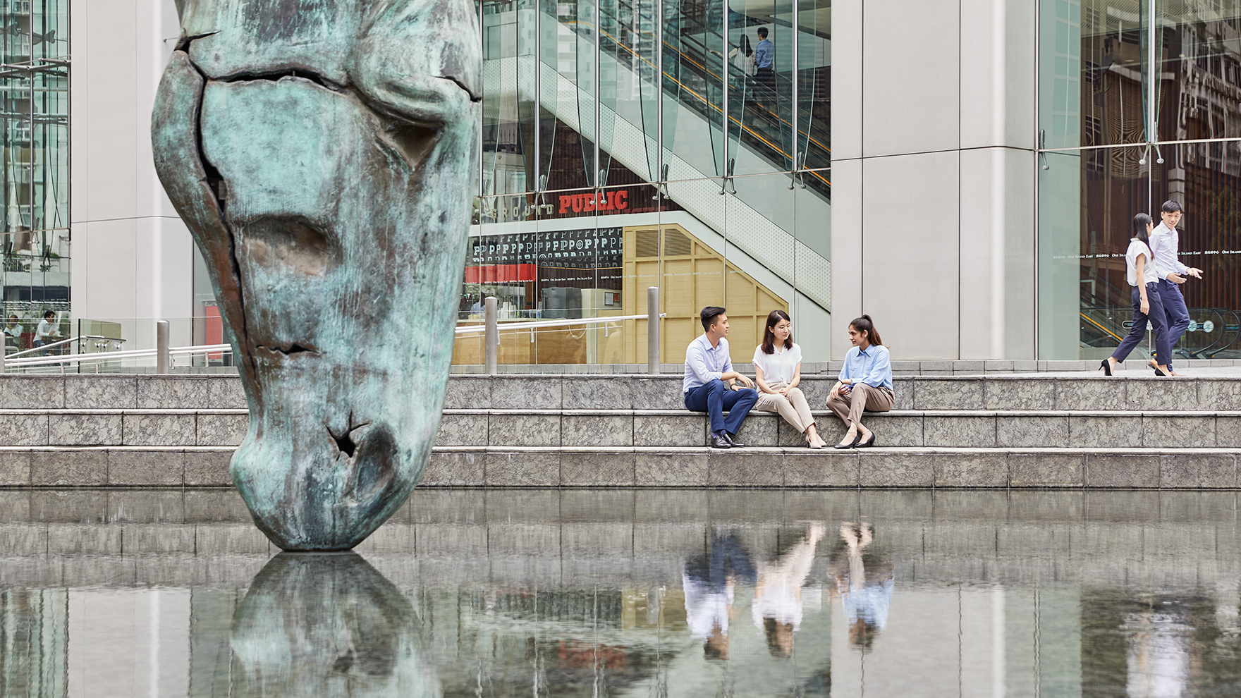 Swire Properties employees sitting at One Island East