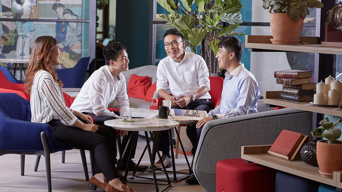 Group of colleagues sitting together for discussion 